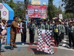 Camat Asembagus Lepas 79 Peserta Gerak Jalan Tingkat SD/MI se-Kecamatan Asembagus